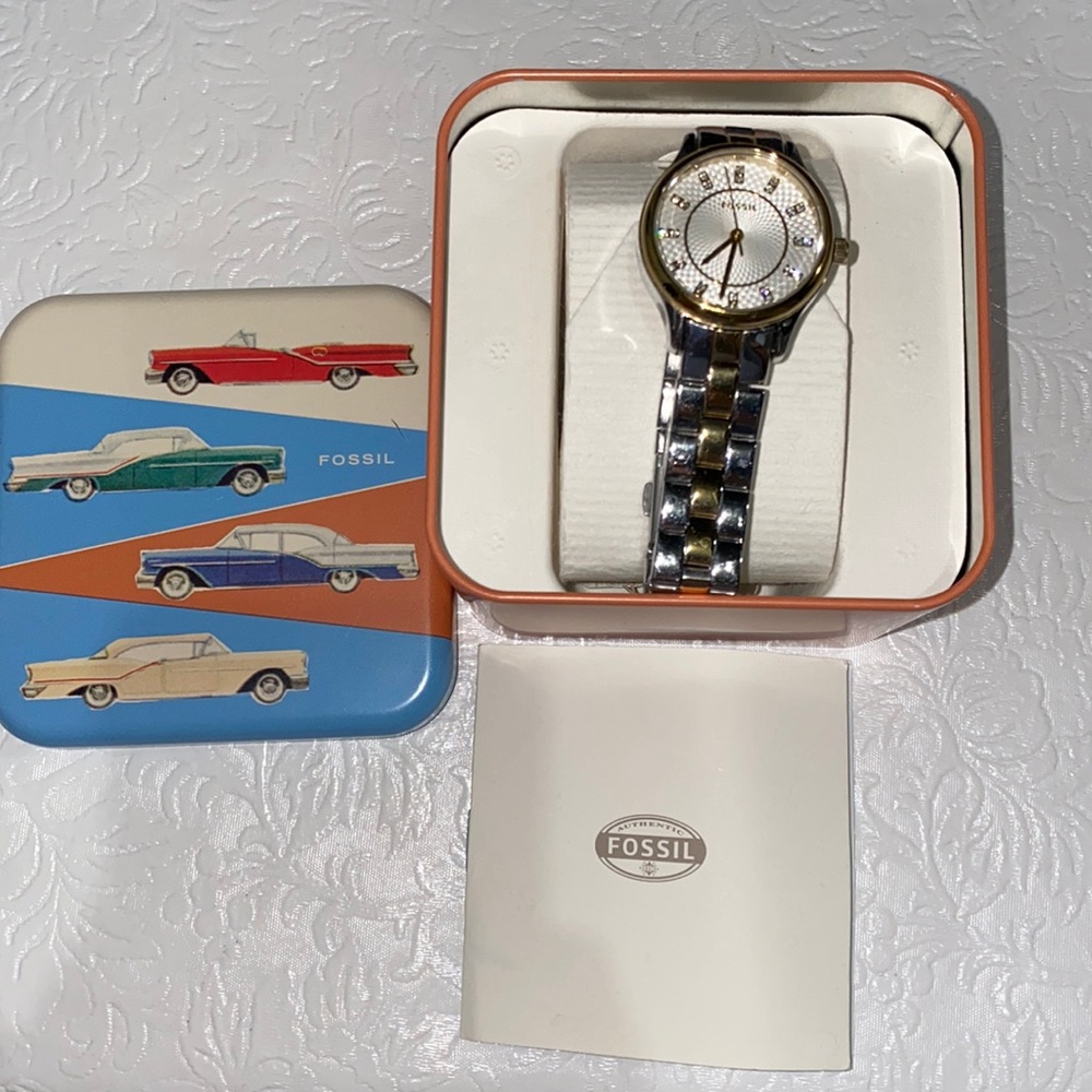Fossil two tone watch. Already has battery